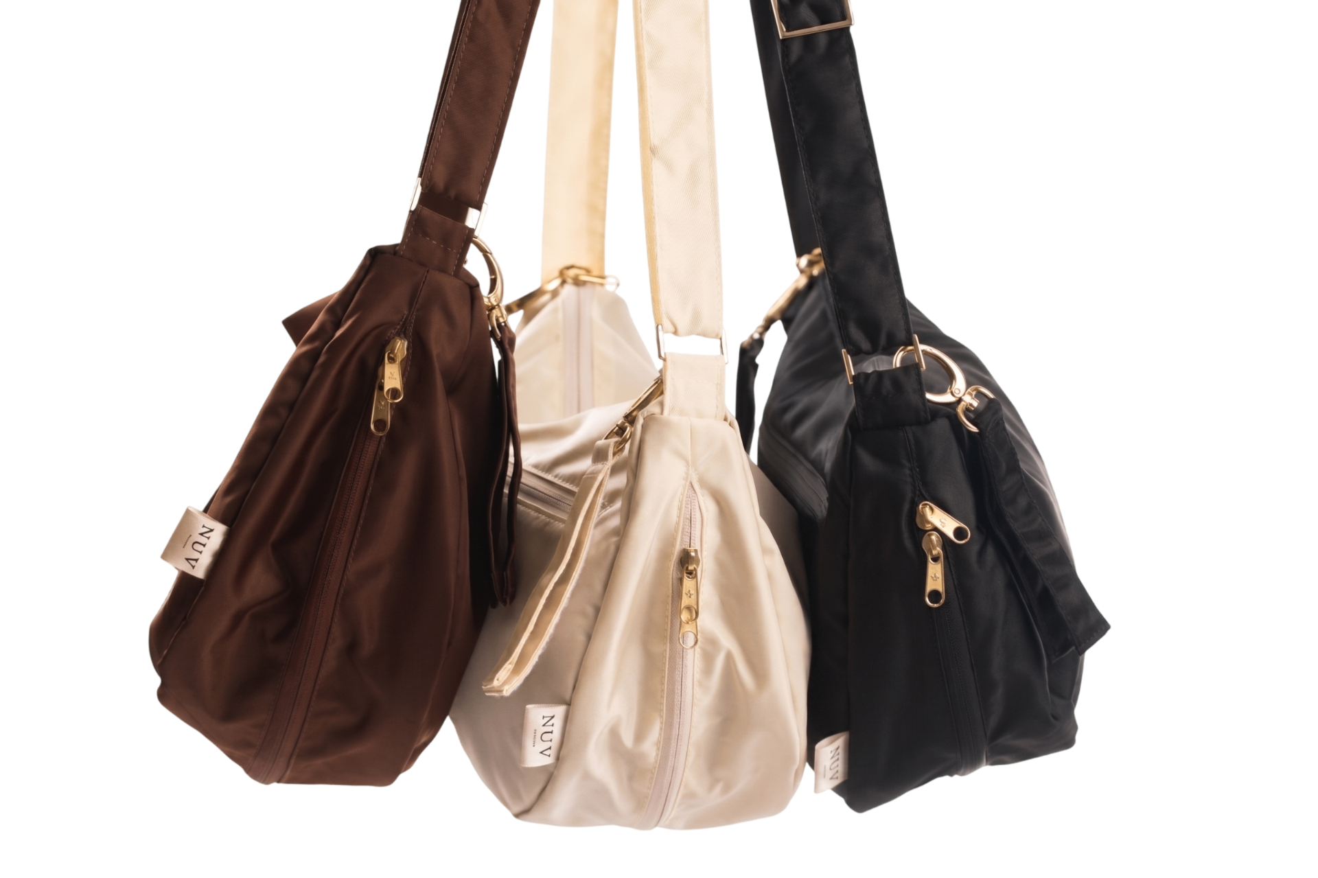 Nuv Studio — the full bag and pouch lineup in cream, brown and black