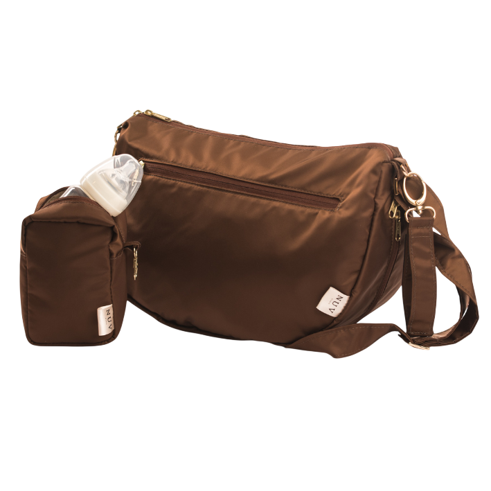 The Luna Bag family — bags, pouches and essentials in Cream, Brown and Black